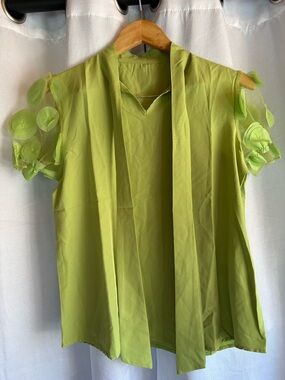 3 for $10 • 
Women’s Lime Green Tie-Neck Blouse with Floral Sleeve Detail